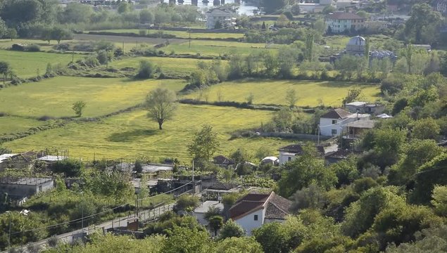 Albanian city Shkoder cityscape with mountain background