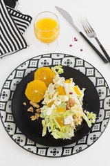 Chinese cabbage salad with orange and walnut