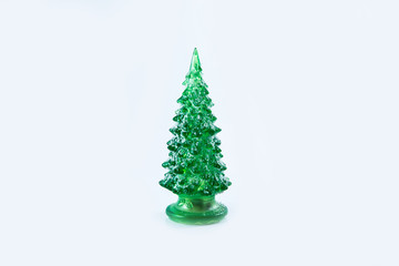 Plastic christmas tree on white background