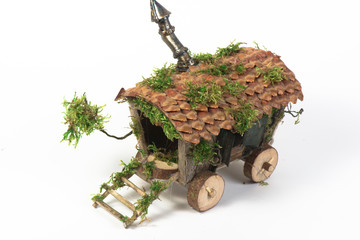 miniature model van wild west moss tree isolated white background