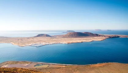 Fotobehang Canarische Eilanden View on La Graciosa Island from Mirador del Rio in Lanzarote, Spain  © szmuli