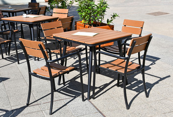 Tables and chairs on the street