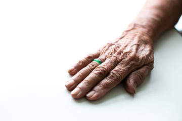 Fototapeta premium closeup hand of old woman. Closeup Skin old. Skin background texture