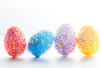 Colorful easter eggs isolated over white background