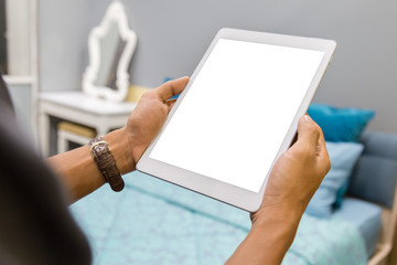 Mockup tablet on businessman hands empty display on home table with blur background. - Image - Image