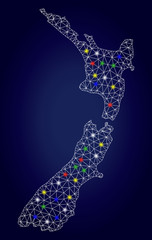 Bright mesh vector New Zealand map with glare light spots. Mesh model for patriotic templates. Abstract lines, dots, glare spots are organized into New Zealand map. Dark blue gradiented background.