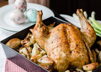 Roasted whole chicken. Easter concept