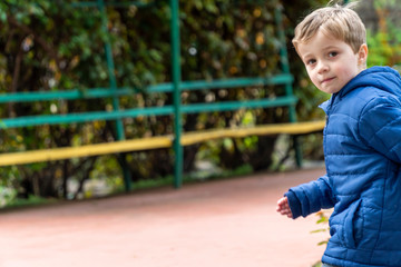 Fototapeta premium Small child running in a park