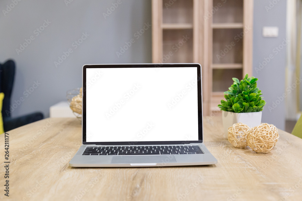 Poster laptop showing blank screen on work table front view in home- image