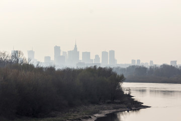 Fototapeta premium View of the city center of Warsaw from the Vistula River. Site about the city, nature, river, Poland.