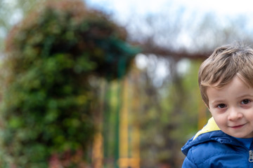 Naklejka premium Small child portrait looking at the camera