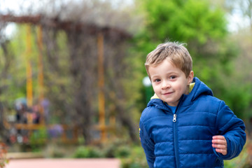 Small child running in a park