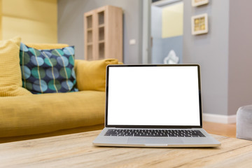 laptop showing blank screen on work table front view in home- Image