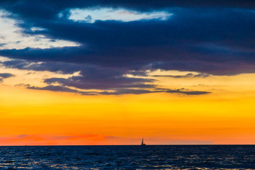 Colorful sunset sky on sea beach