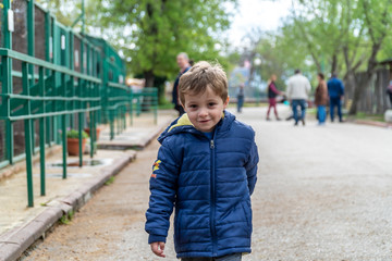 Small child running towards the camera