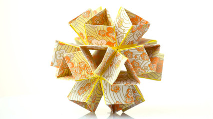 Beautiful modular origami flower. Wonderful geometrical art. Beauty of kusudama craft.