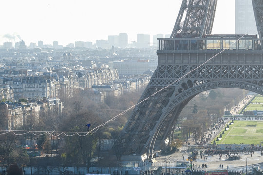 a man walk on a highline between Eiffel tower and Trocadero, &Icirc;le de France, Paris, France
