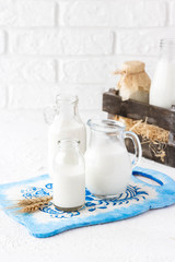 Milk in bottles of various shapes and sizes