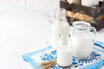 Milk in bottles of various shapes and sizes