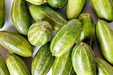 pointed gourd potol green vegetable on white background
