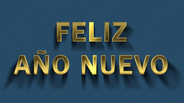 Animation of colored particles turn into blue background and inscription - Feliz Ano Nuevo, Happy New Year in spanish language.
