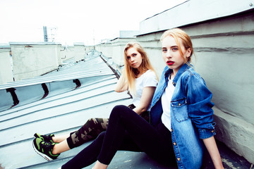 two cool blond real girls friends making selfie on roof top, lifestyle people concept, modern teens