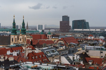 Fototapeta na wymiar View of Vienna from cathedral tower with some old and new buildings