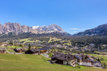 Fototapeta na wymiar Panorama of Cortina D'Ampezzo town surrounded by the Dolomites Alps, South Tyrol, Italy