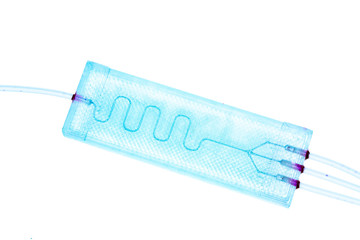 Organ-on-a-chip (OOC) - microfluidic device chip that simulates biological organs that is type of artificial organ. Prototype of design lab-on-a-chip in microfluidic laboratory