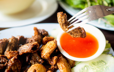 Soft gut Fried until crispy Along with the tomato sauce dip