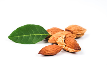 Dry Almonds nuts with shell on white background ,health food.