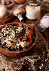 Cooked quinoa in a wooden bowl