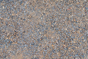 Colorful sand or pebble texture. Seamless texture on ground texture.