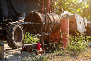 old oil barrels are ready to recycle Industrial,Agro-industry of household Rural style in Thailand.