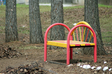 Bright yellow-red Park bench