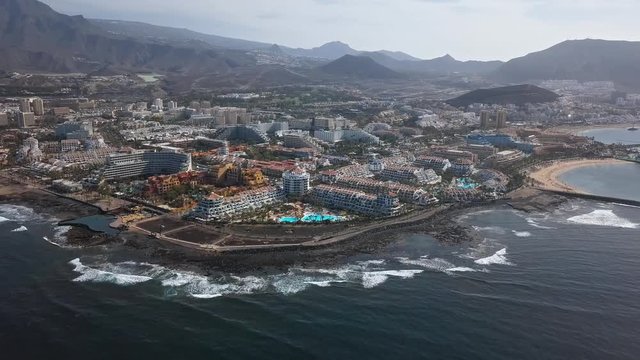 Aerial panorama of Los Cristianos resorts and Playa del Camison beach, Tenerife, Canary islands, Spain.