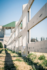 Upward Shot of White Board Fence on an Old Farm