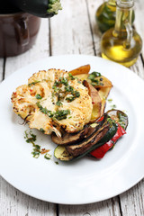 Cauliflower with mushrooms baked potatoes. Vegetarian cooking
