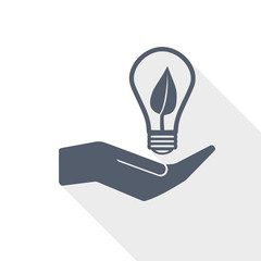 Eco green energy concept hand and bulb vector icon