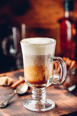 Irish coffee in drinking glass