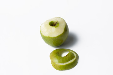 Green apple isolated on a white background.Apple peeling