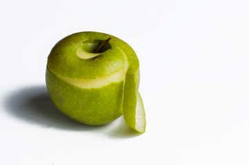 Green apple isolated on a white background.Apple peeling
