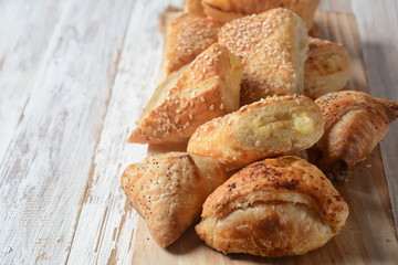 Vegetarian samosas pastries filled with potato, mushrooms, tuna. Middle Eastern food- samsa Bourekas delicious Middle Eastern hand pies. Baked, stuffed pastries filled with potato, mushrooms, tuna.