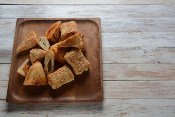 Vegetarian samosas pastries filled with potato, mushrooms, tuna. Middle Eastern food- samsa Bourekas delicious Middle Eastern hand pies. Baked, stuffed pastries filled with potato, mushrooms, tuna.