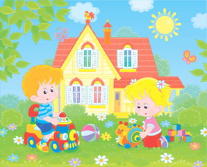 Obraz na płótnie Canvas Small children playing with toys among flowers on green grass of a front lawn of their house on a sunny summer day, vector illustration in a cartoon style