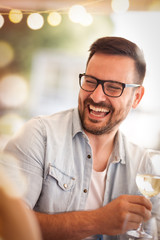 happy man on  party with wine glass in hand