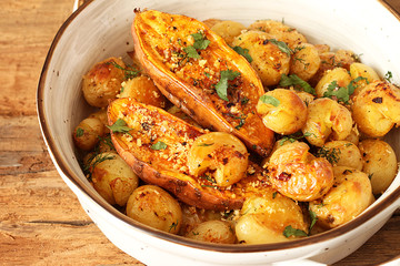 Baked potatoes with garlic and herbs