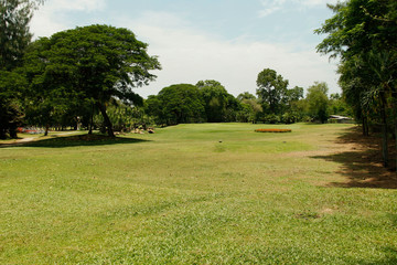 Fototapeta premium The evening golf course has sunlight shining down at golf course in Thailand