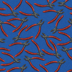 pliers with orange handle on blue denim background seamless patern