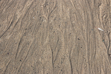 abstract blurred background with gray sand.